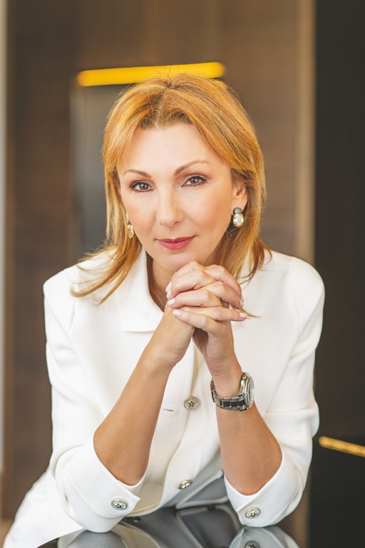 Ms. Melina Travlos